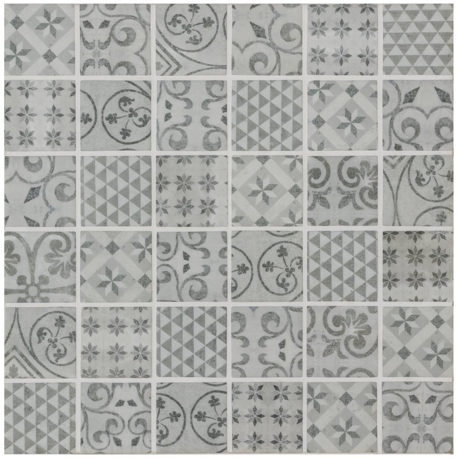 Medine patterned mosaic gray mosaic tile with vintage inspired patterns in varying shades of gray on light background