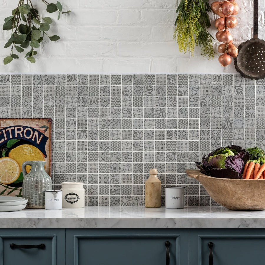 Gray medine patterned mosaic tile backsplash featuring intricate repeating geometric patterns for wall decor