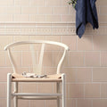 White wishbone melford baroque chair with woven natural fiber seat ideal for stylish indoor seating