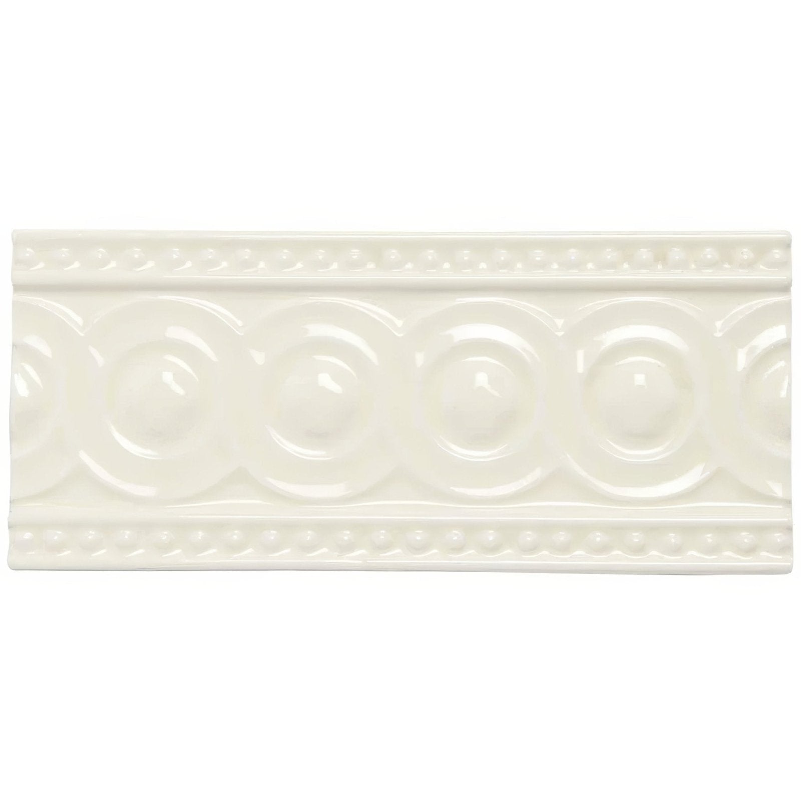 Cream-colored ceramic Melford Baroque tile with raised circular pattern and decorative beaded borders