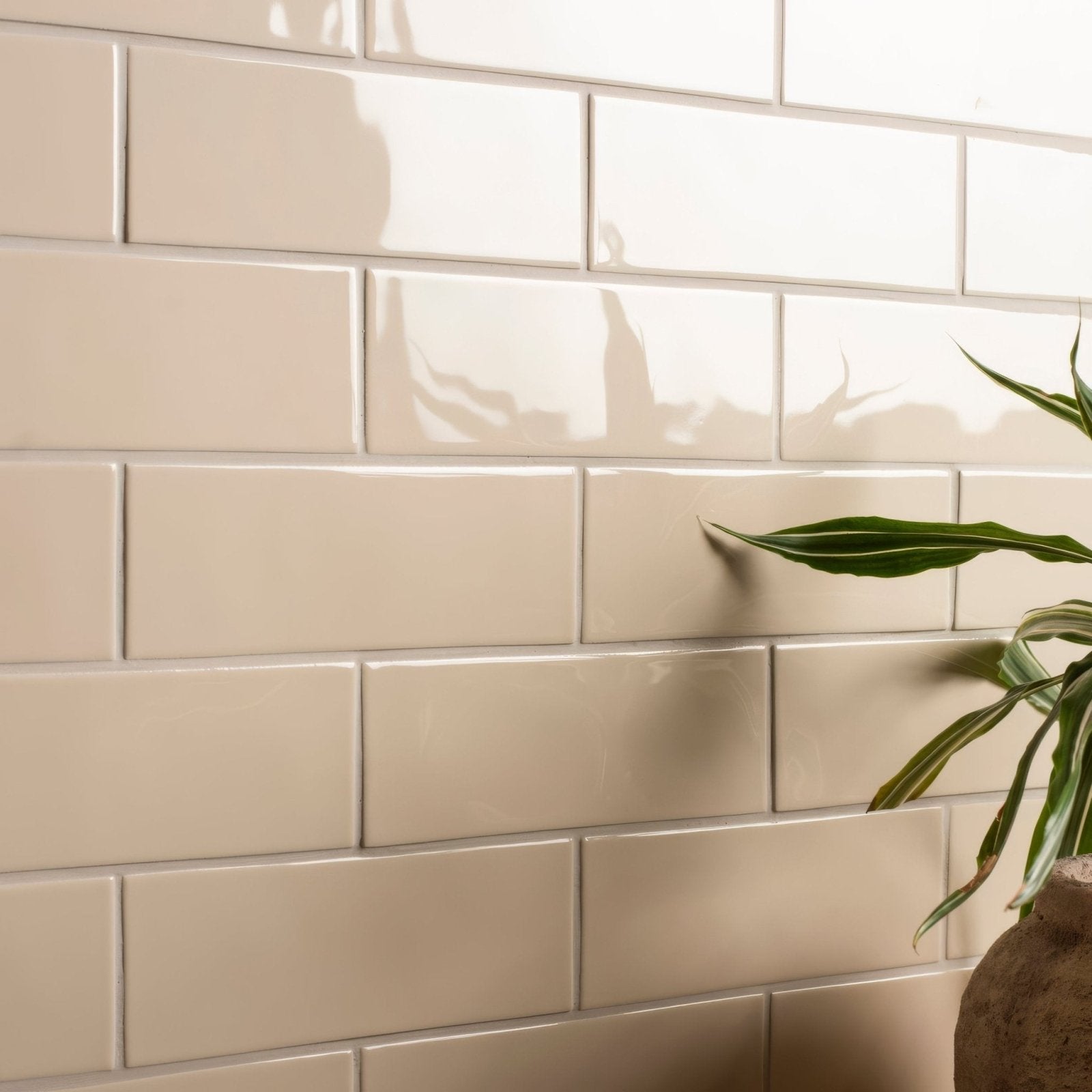 Beige glossy subway brick tile melford arranged in a classic brick pattern for wall use
