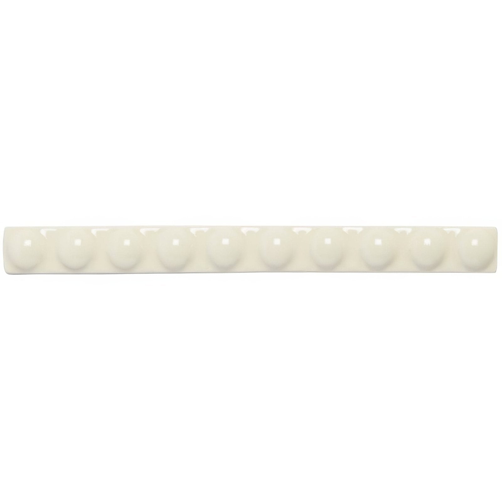 Cream-colored ceramic melford empire bar with evenly spaced rounded domed protrusions along its length