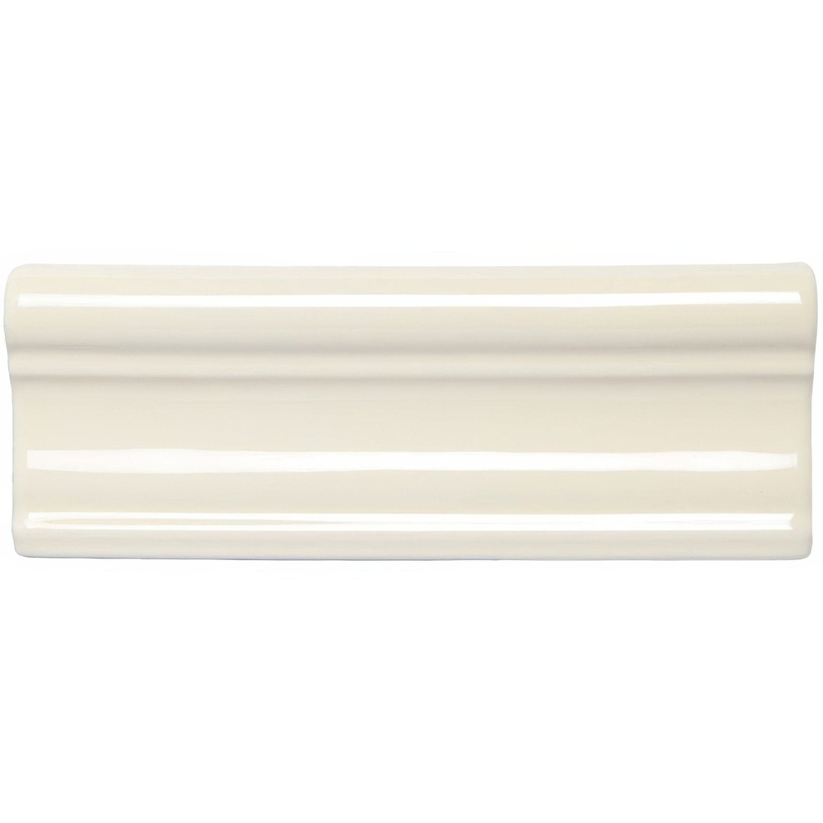 Cream-colored melford hampton ceramic tile with glossy finish and raised wavy decorative molding on top edge
