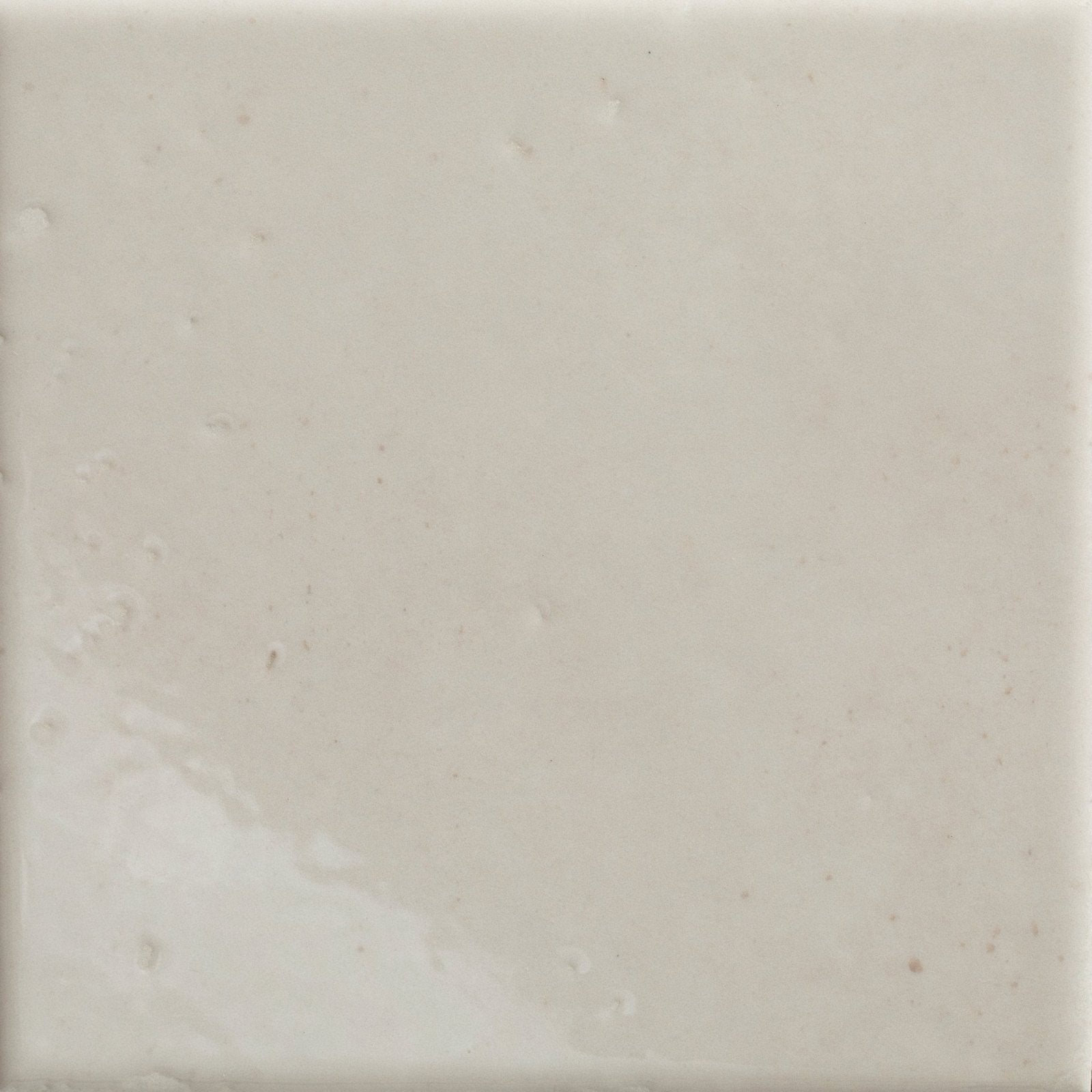 Cream-colored menara white porcelain gloss square tile with smooth slightly textured surface and subtle natural veining
