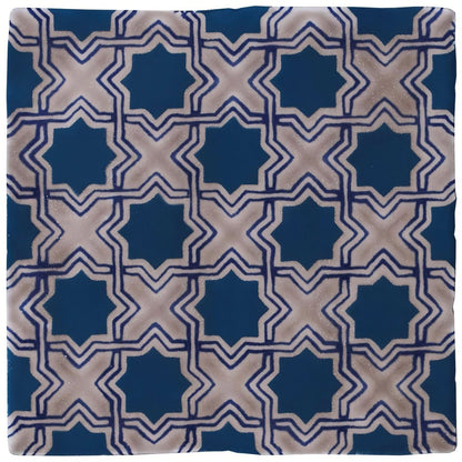 Merles on truffle tile with blue and beige geometric star-shaped patterns for decorative flooring and walls