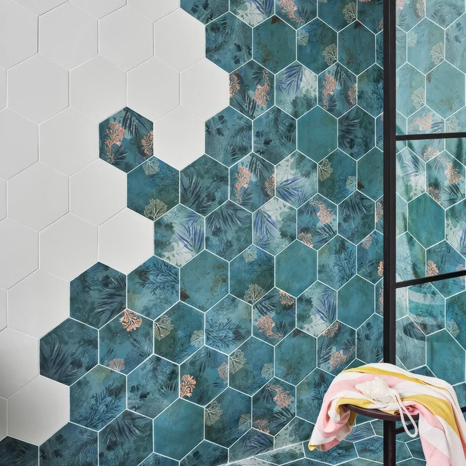 Mermaid’s garden porcelain tiles with teal hexagonal botanical pattern white accents framed by black metal