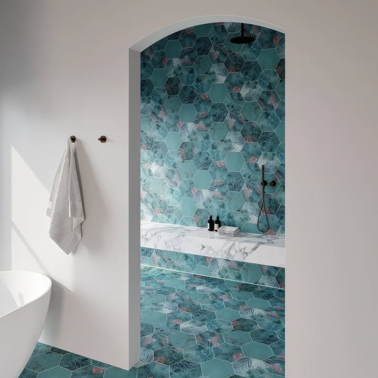 Teal hexagonal mermaid’s garden porcelain tiles with tropical leaf and pink floral patterns on shower wall floor and bench