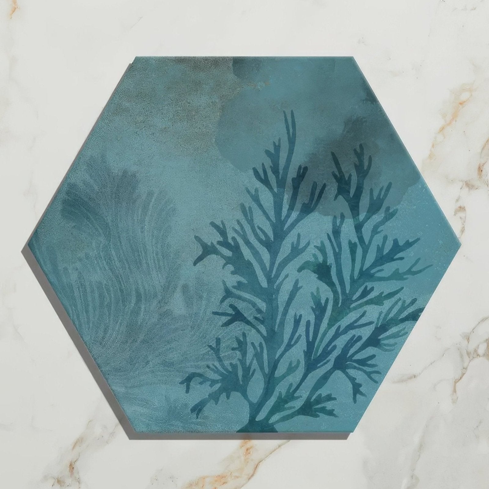 Hexagonal mermaid’s garden porcelain tile with textured teal blue surface and intricate dark blue coral design