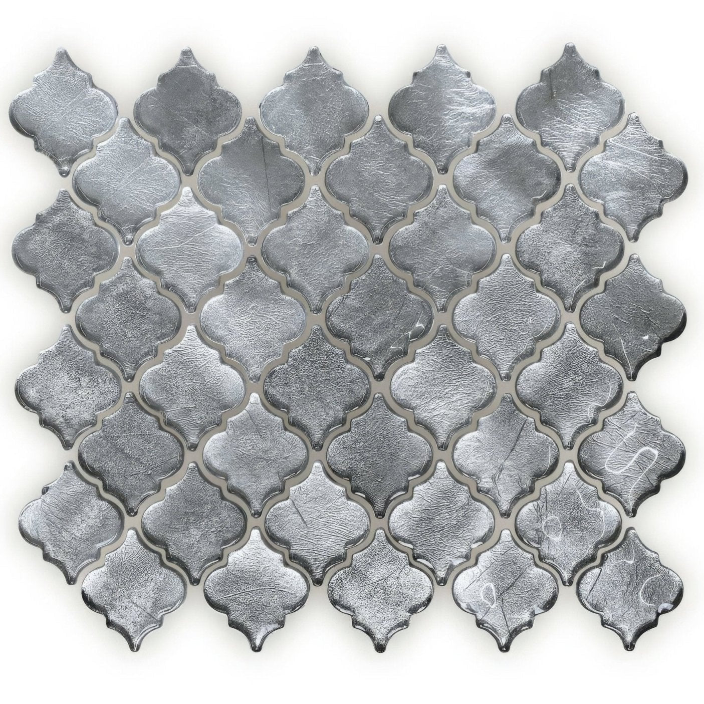 Silver metallic quatrefoil mosaic tile with textured reflective surface in metallic vitreum argentum arabesque glass design