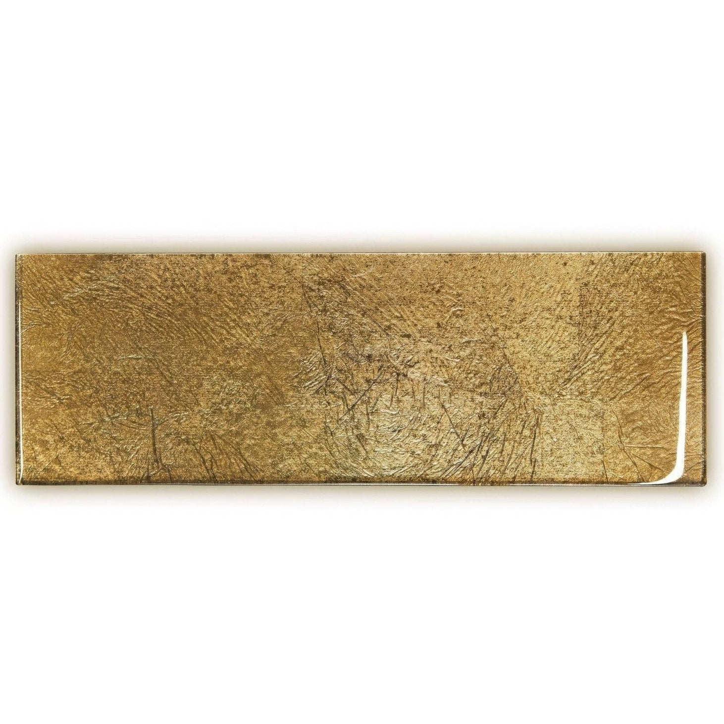 A rectangular gold glass tile with a textured brushed metallic finish and subtle surface scratches from Metallic Vitreum Aurum