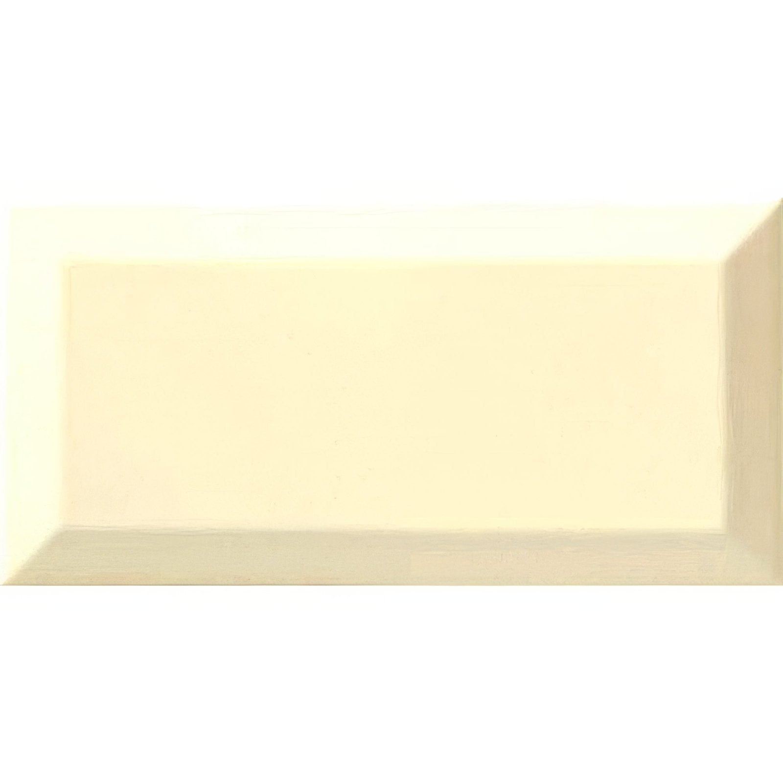 Cream-colored metro bone ceramic gloss tile with subtle glossy finish and raised edges rectangular shape