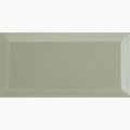 A sleek rectangular ceramic tile with a matte sage green finish and subtle beveled edges from Metro Sage Ceramic Gloss