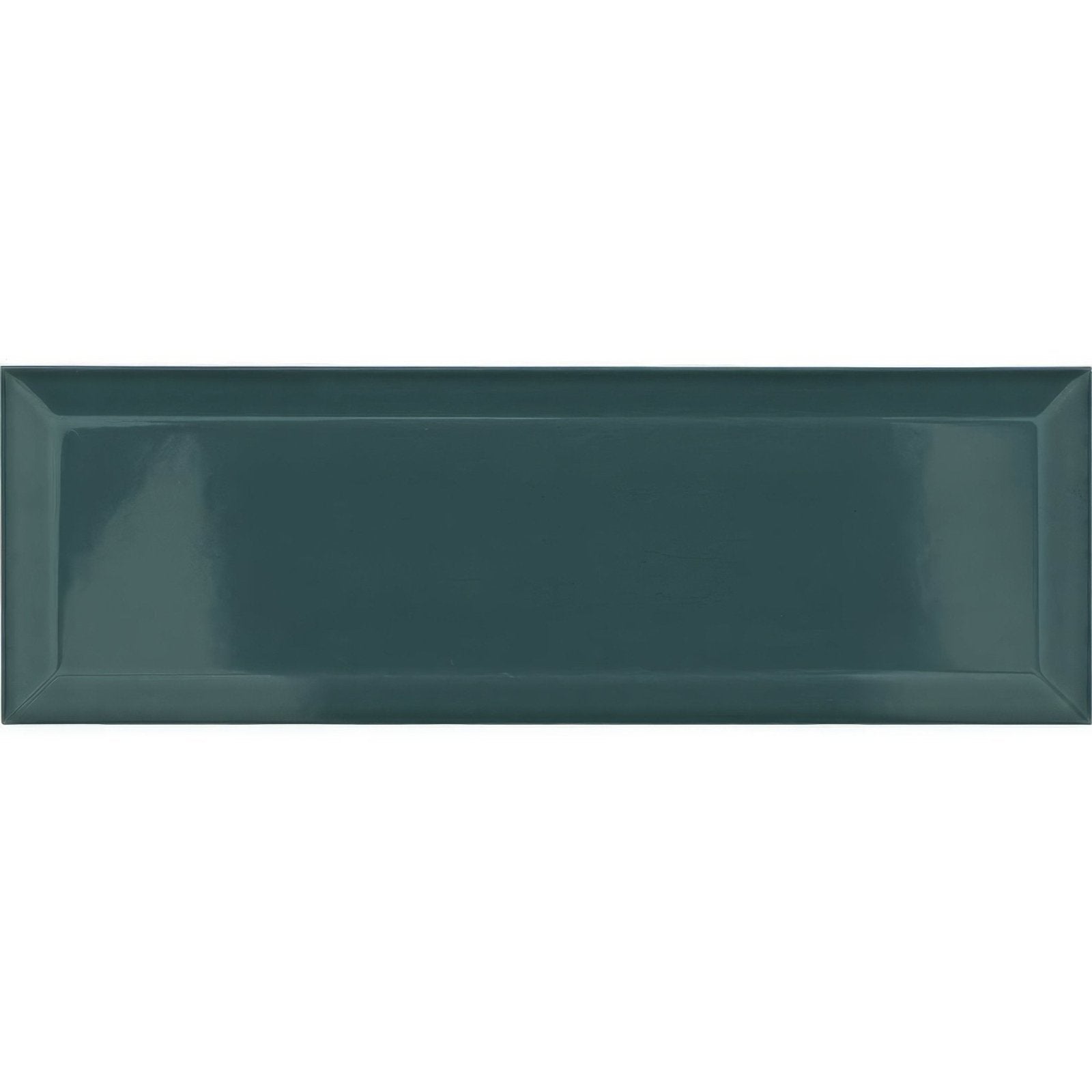 A sleek glossy dark teal ceramic rectangular tile with a subtle raised border metro turquoise ceramic brick tile
