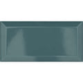 A sleek glossy teal ceramic tile with a subtle raised border and smooth reflective surface metro turquoise ceramic gloss