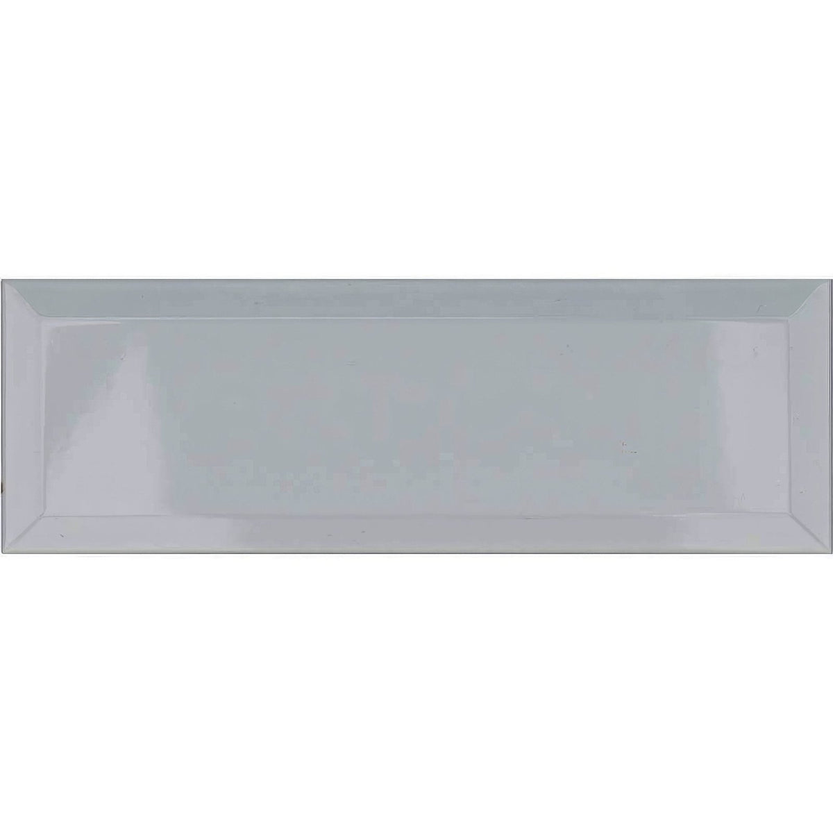 A sleek rectangular metro white ceramic brick tile serving tray with glossy finish and slightly raised edges