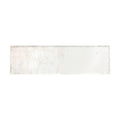 A rectangular white ceramic tile metropolitan london with subtle marbled texture and rough uneven edges