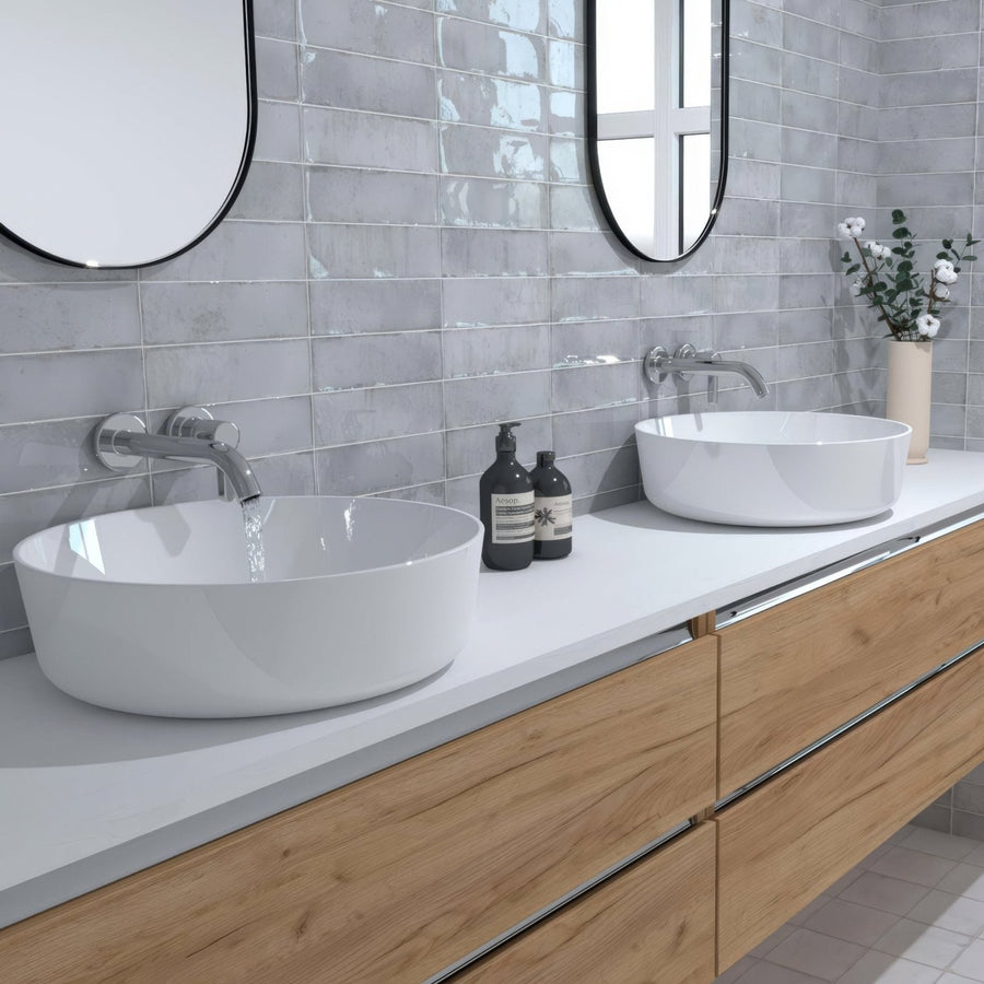 White ceramic vessel sinks with sleek modern design in metropolitan new york style for bathroom use