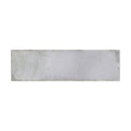 A metropolitan new york rectangular light gray concrete tile with subtle texture and slightly uneven edges