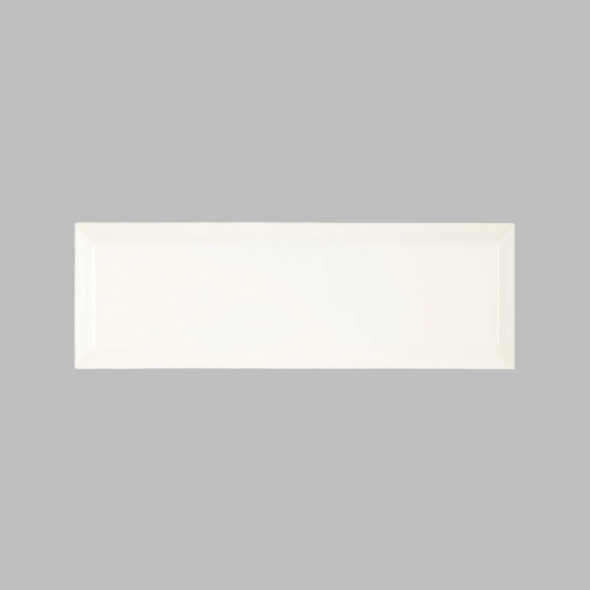 
A sleek rectangular white ceramic metropolitan queensway glazed metro tile with smooth glossy finish and raised edges