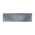 A rectangular matte-finished gray metropolitan sydney tile with subtle texture and slightly uneven edges