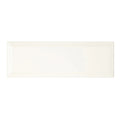 Cream-colored rectangular ceramic tile with a glossy finish metropolitan queensway glazed metro tile