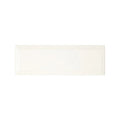 Cream-colored rectangular ceramic tile with a glossy finish from metropolitan queensway glazed metro tile collection