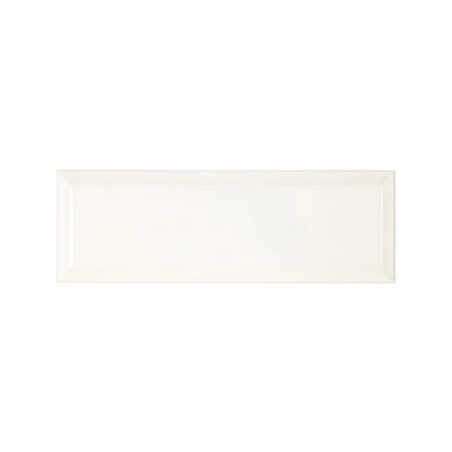 Cream-colored rectangular ceramic tile with a glossy finish from metropolitan queensway glazed metro tile collection