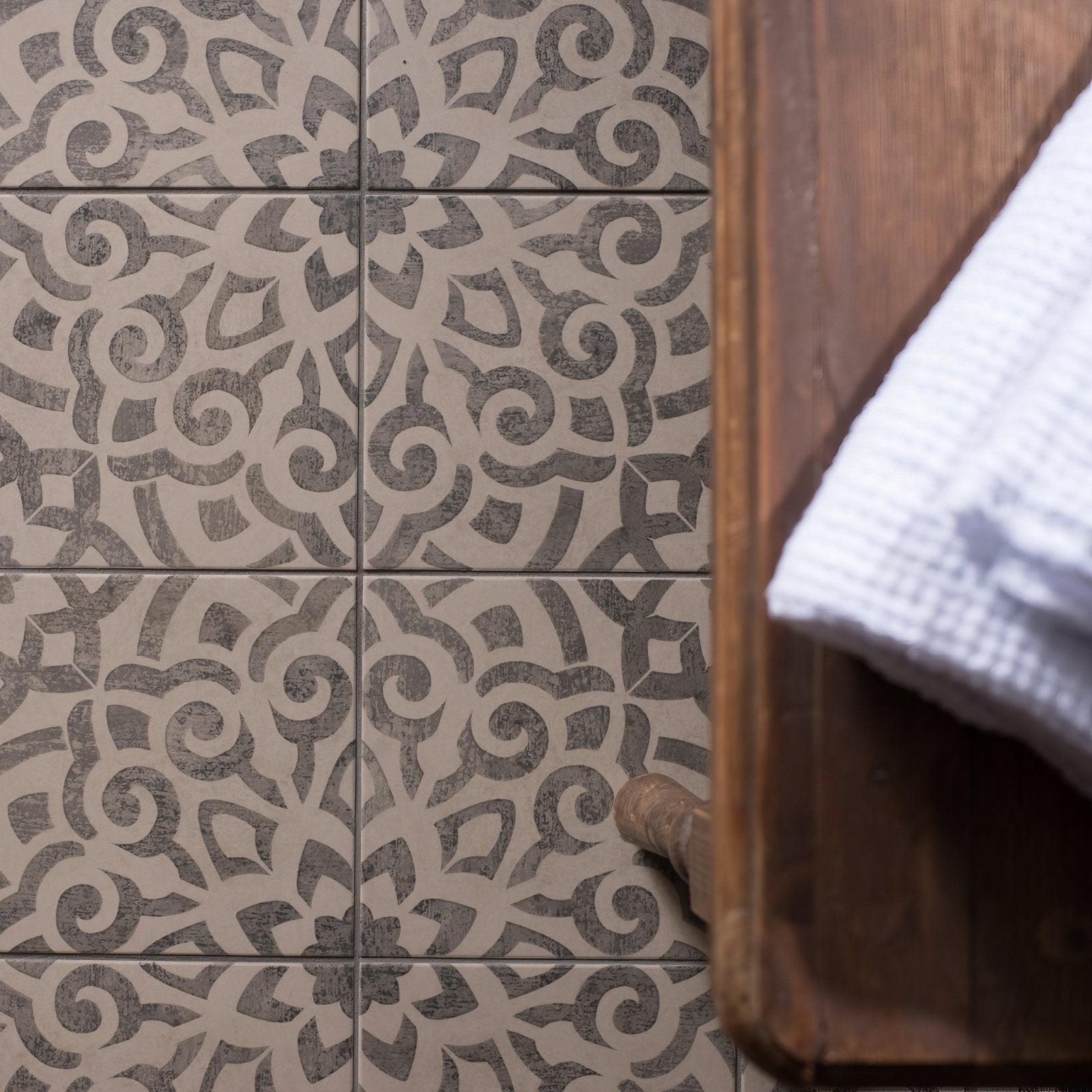 Beige and gray ornate patterned ceramic floor tiles from mezzo fantasia collection for decorative flooring