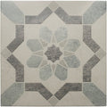 Mezzo Piano square mosaic tile with a symmetrical gray and off-white stone textured starburst geometric pattern