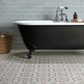 Mezzo piano black clawfoot bathtub with white porcelain top and chrome faucet for elegant bathroom use