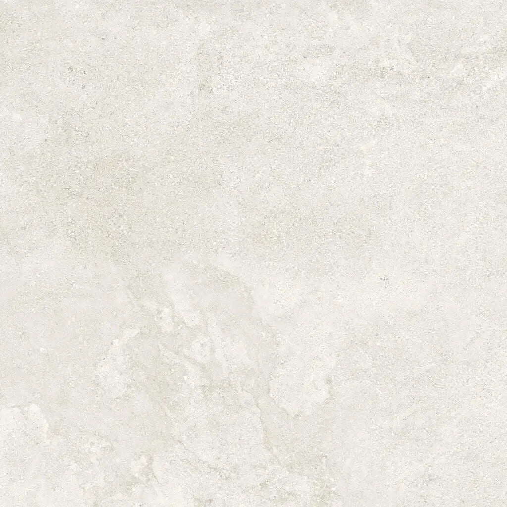 Mineral cream porcelain stone tile in 100 x 100cm with cream color, subtle gray veining, and matte textured surface