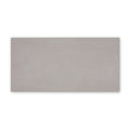 A sleek rectangular gray ceramic Moderna Grey porcelain tile with a subtle matte finish measuring 60 by 30 cm