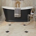 Monarch Marble Honed Finish beige marble tiles with a black freestanding bathtub