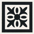 Montague black on dover white tile with black and white geometric pattern featuring symmetrical floral design