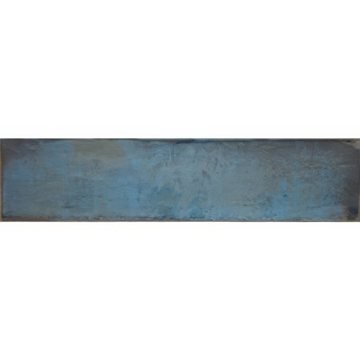 A rectangular ceramic tile montblanc blue 30x7.5cm with textured muted blue glaze and subtle tone variations
