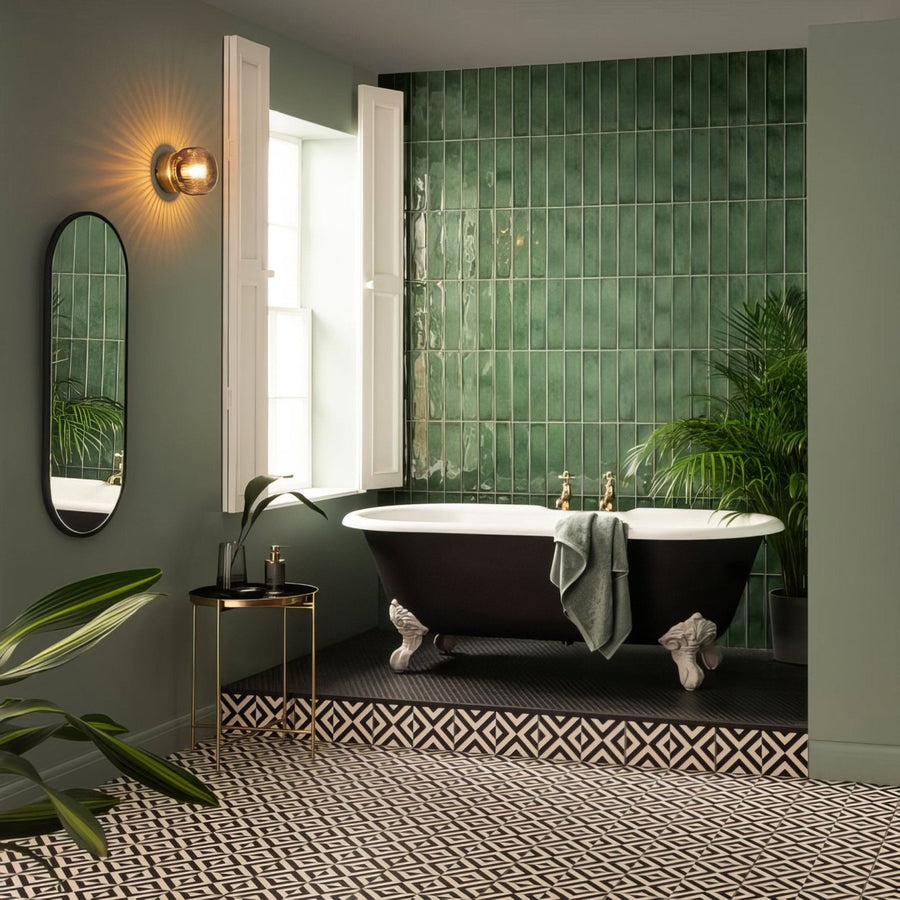 Black clawfoot bathtub montblanc emerald 30x7.5cm with white porcelain interior and gold toned fixtures