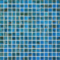 Monte cristo gold fleck glass mosaic 20mm featuring blue textured translucent tiles with subtle golden streaks