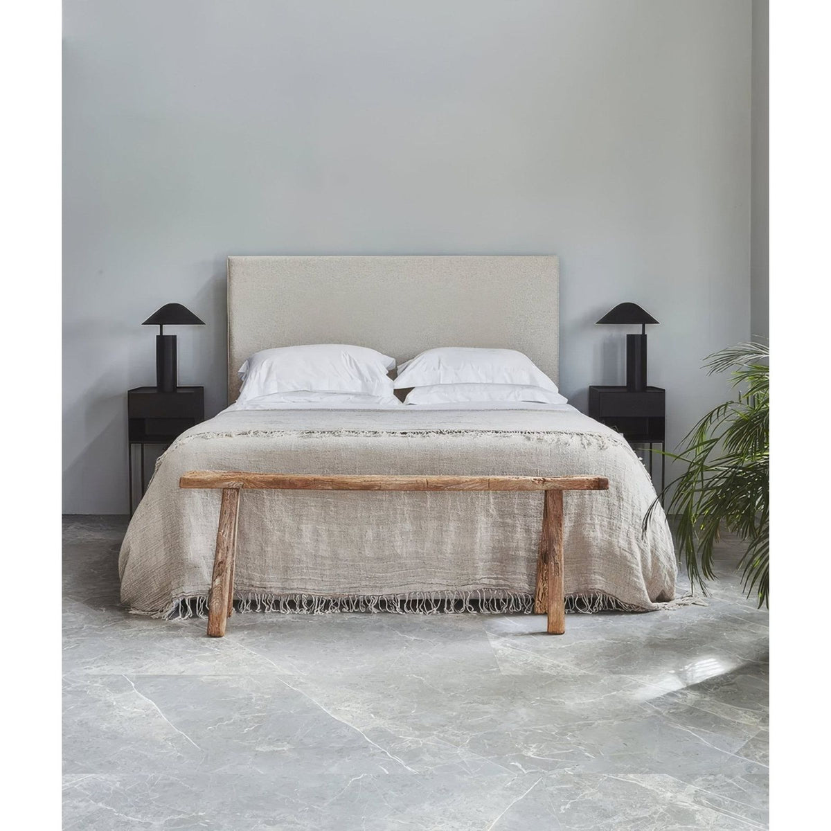Monza Minerale Pure Matt Click Tile grey marble-effect LVT with an upholstered bed and nightstands
