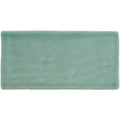 A rectangular matte-finished teal ceramic brick tile moselle with a subtle textured surface