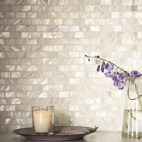 Mother of Pearl White Rectangle Brick Mosaic iridescent white shell brick mosaic with purple bellflowers in a glass vase