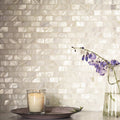Mother of Pearl White Rectangle Brick Mosaic iridescent white shell brick mosaic with purple bellflowers in a glass vase