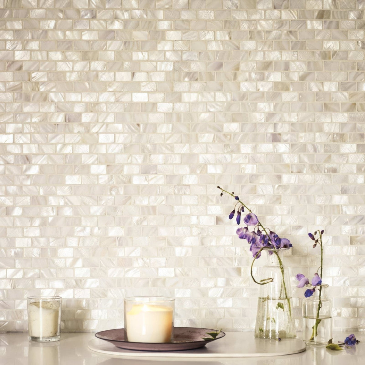 Iridescent white mother of pearl rectangle brick mosaic tile wall showcasing glossy natural shell finish