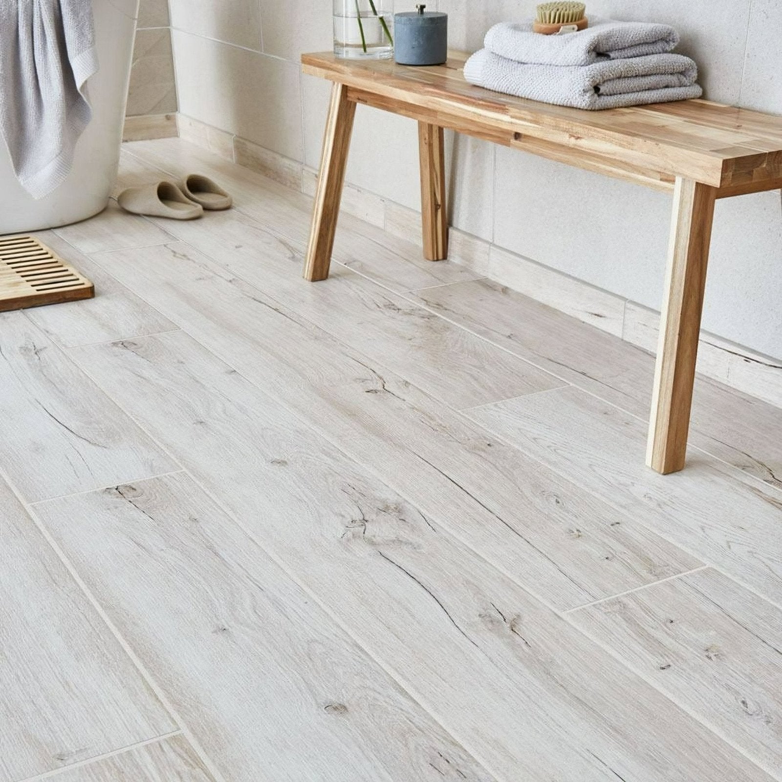 Mumble B Light Oak Tiles light gray wood-look vinyl plank flooring with natural grain pattern for durable indoor use