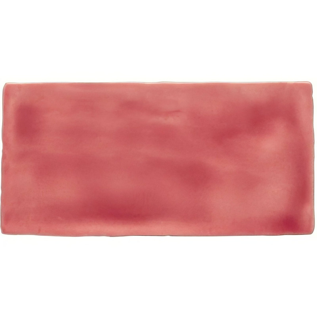 A rectangular musk brick tile in ceramic with a soft pink matte finish and subtle marbled texture