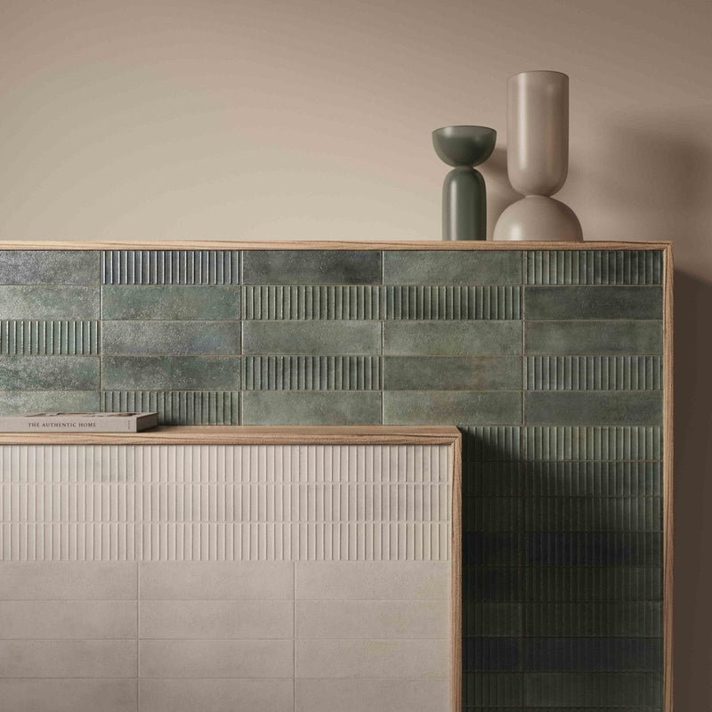 Mussa green brillo ceramic tiles with textured vertical ridges arranged in a modern geometric pattern