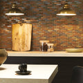 Naga Stone and Ceramic Mosaic dark slate and gold mosaic with a rustic wooden cutting board