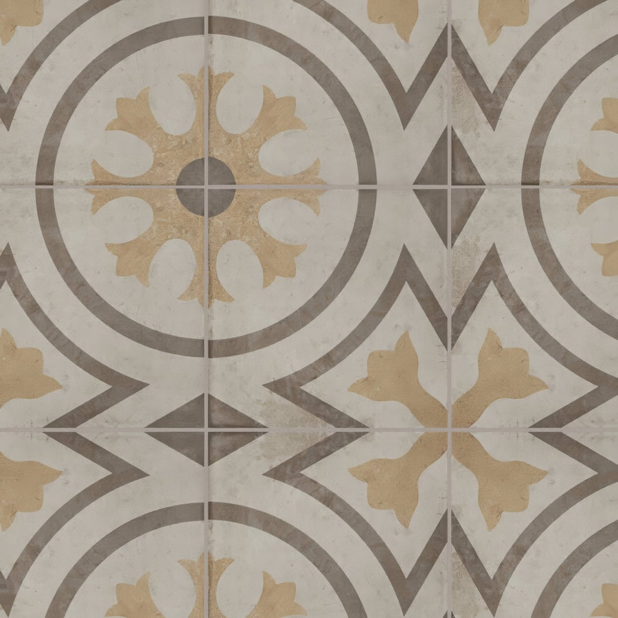 Beige and gray ornamental floor tiles with a vintage floral pattern from the naples viola collection