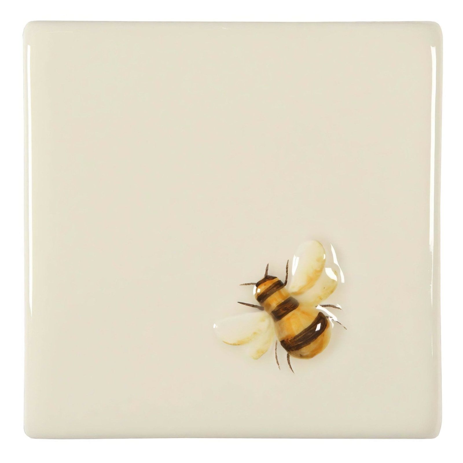 Cream-colored ceramic coaster with a detailed glossy yellow and black bee design from napoleon bee on off white collection