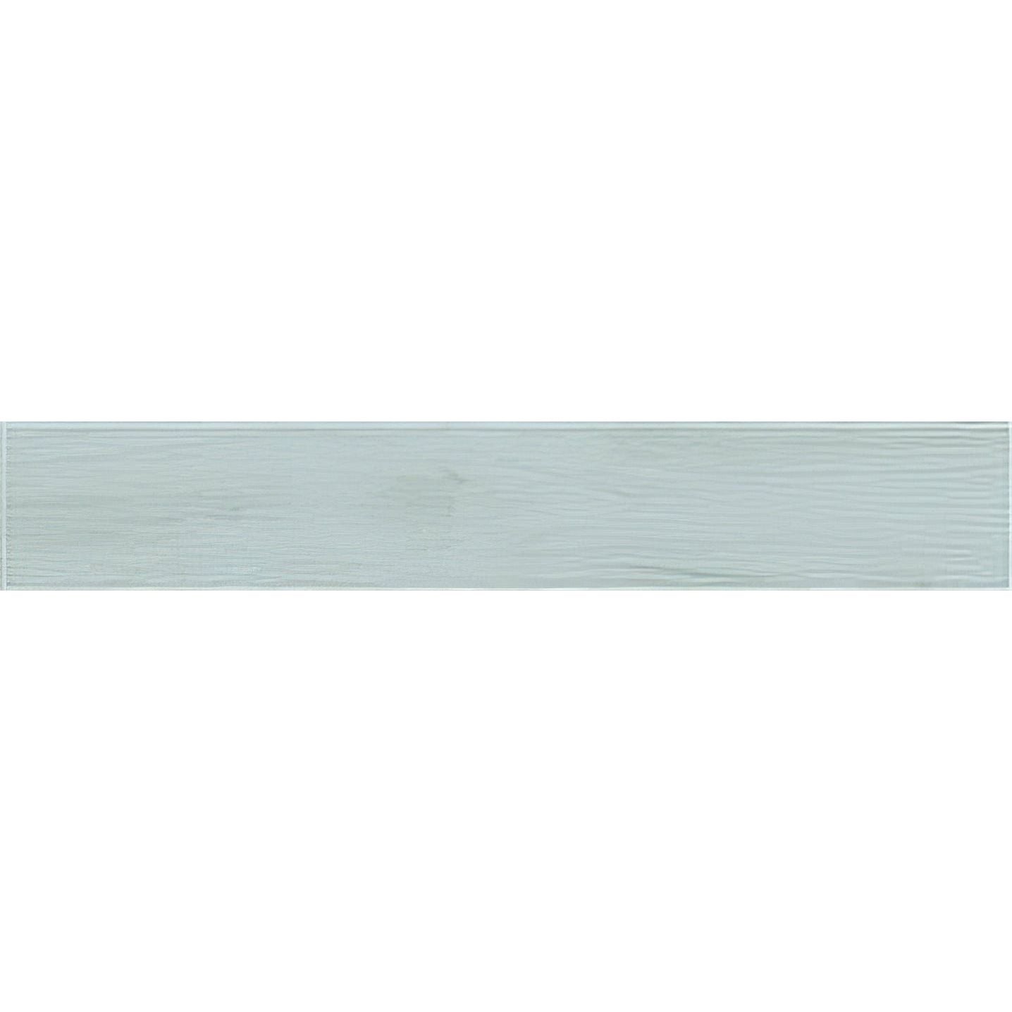 A rectangular light mint green ceramic tile with subtle wood grain texture nebraska aqua matt 60x10cm