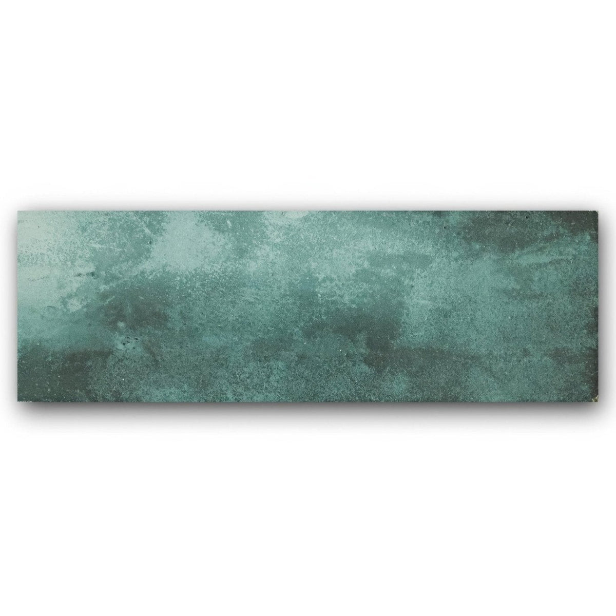 A rectangular ceramic tile with a textured mottled teal and green patina finish nebula green 10 x 30cm